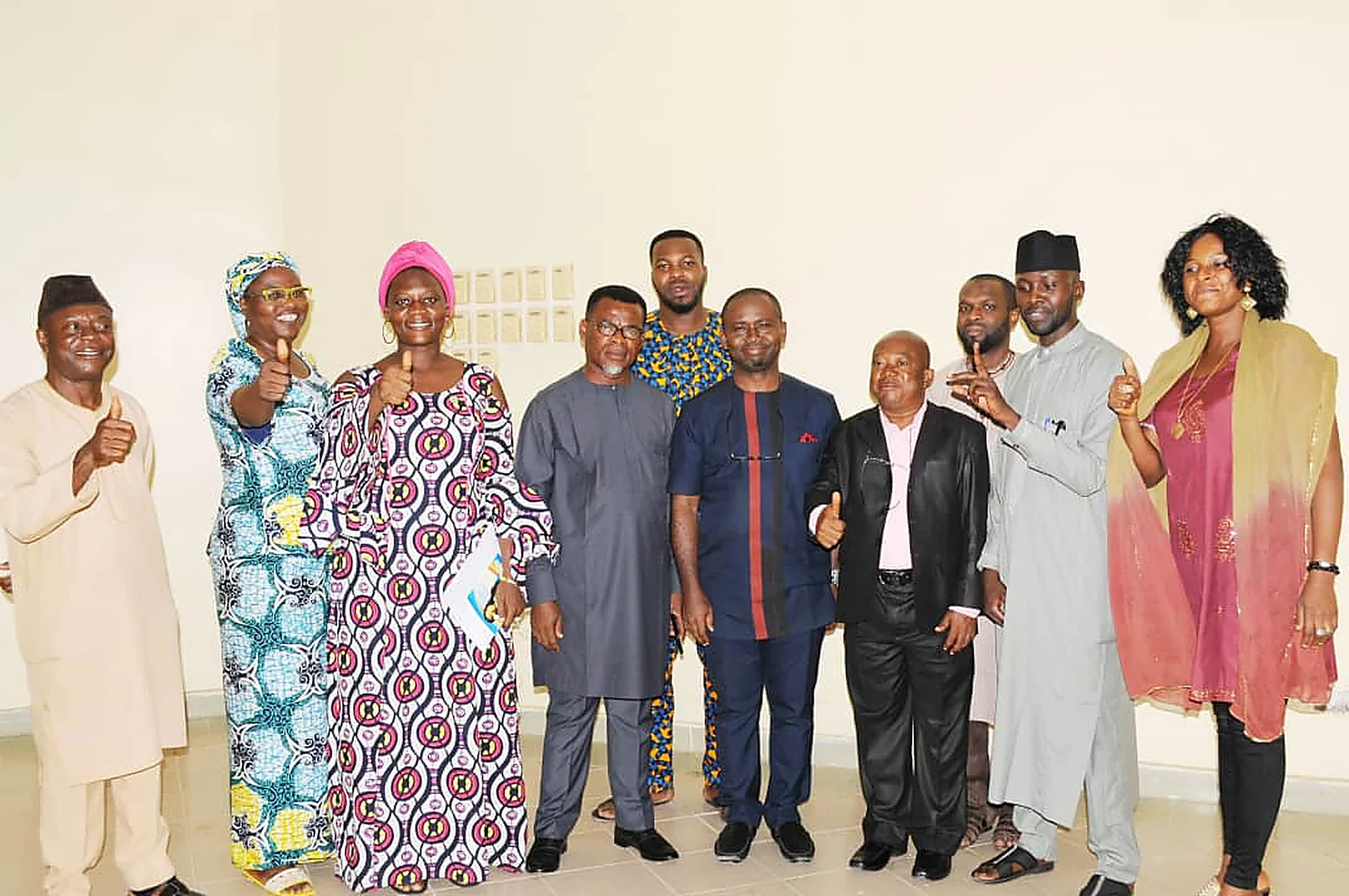 Participants standing together for a group photograph at the close of the ICT training